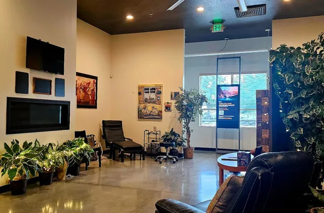 The Sablefish reception lounge with plants and armchairs