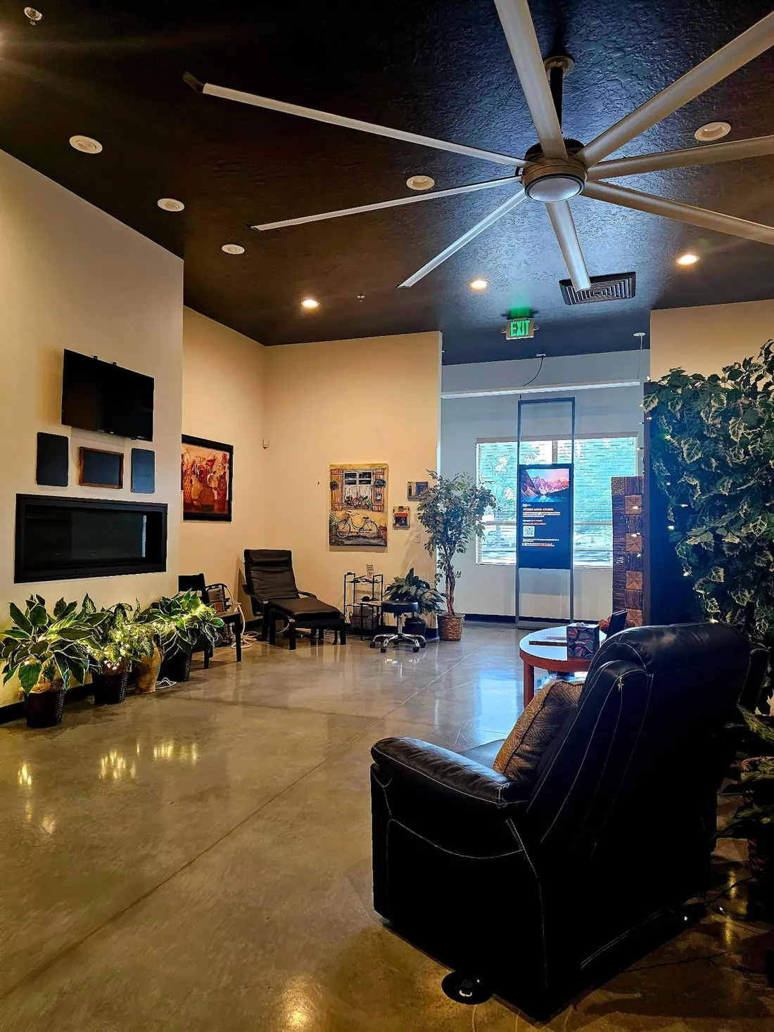 The Sablefish reception lounge with plants and armchairs